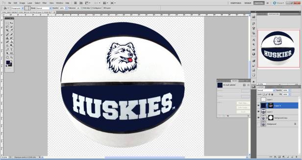 Using the Paint Bucket Tool, click on the image to flood the masked selection with the color